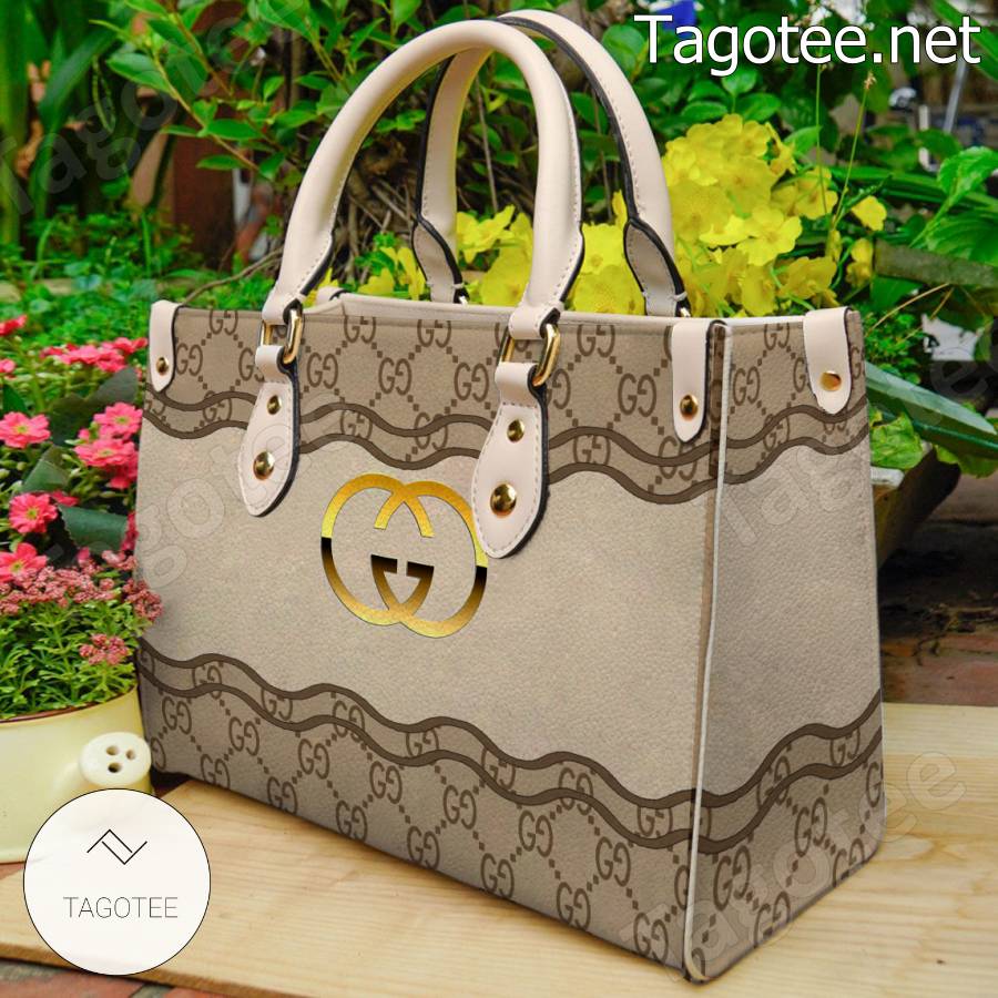 Gucci Gold Logo Center Beige Handbag a